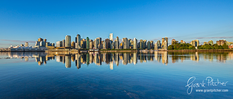 Downtown Vancouver with a view from the amazing Canada Place cruise ship terminal, where we departed from on our cruise to Alaska, to Stanley Park on the right of the image view.